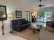 Bright living room with sliding doors opening to backyard at 1666 Pintail Way # 9, Sarasota, FL 34231