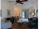 Open concept living room with access to dining and entry at 1666 Pintail Way # 9, Sarasota, FL 34231