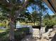 Relaxing patio with seating area overlooking a peaceful pond and fountain at 1666 Pintail Way # 9, Sarasota, FL 34231