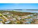 Aerial view of waterfront property with homes and boat docks at 1956 Massachusetts Ave, Englewood, FL 34224