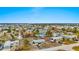 Aerial view of home and neighborhood near the water at 1956 Massachusetts Ave, Englewood, FL 34224