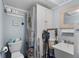 Small bathroom with toilet and sink at 1956 Massachusetts Ave, Englewood, FL 34224