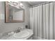 Clean bathroom with a shower and vanity at 1956 Massachusetts Ave, Englewood, FL 34224