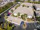 Aerial view of building complex, showing multiple units and ample parking at 200 Mirabella Cir # 201, Venice, FL 34292