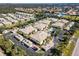 Aerial view of community with pool and surrounding buildings at 200 Mirabella Cir # 201, Venice, FL 34292