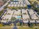 Aerial view of community, highlighting building layout and pool at 200 Mirabella Cir # 201, Venice, FL 34292