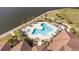 Resort-style pool with lounge chairs and a spa at 2114 5Th E St, Palmetto, FL 34221