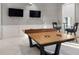 Game room features ping pong table and two large TVs at 2114 5Th E St, Palmetto, FL 34221