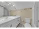 Simple bathroom with a vanity, toilet and shower at 235 64Th St, Holmes Beach, FL 34217