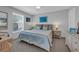 Spacious bedroom with a king-size bed and ample natural light at 235 64Th St, Holmes Beach, FL 34217