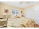 Spacious bedroom with king-size bed, wood floors, and a large closet at 2424 Post Rd, Sarasota, FL 34231