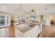 Open kitchen island with granite countertops and stainless steel appliances at 2424 Post Rd, Sarasota, FL 34231