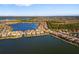 Aerial view of lakefront community at 275 Toscavilla Blvd, Nokomis, FL 34275