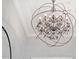 Large, round crystal chandelier with a metal frame at 275 Toscavilla Blvd, Nokomis, FL 34275