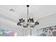 Multi-light linear chandelier with glass cylinders at 275 Toscavilla Blvd, Nokomis, FL 34275