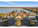 Resort-style clubhouse with lake view at 275 Toscavilla Blvd, Nokomis, FL 34275