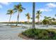 Resort-style pool with lounge chairs and palm trees at 275 Toscavilla Blvd, Nokomis, FL 34275