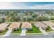 Aerial view of the property and surrounding houses at 2831 Whispering Pine Ln, North Port, FL 34287