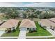 Aerial view showcasing the home's location in a quiet neighborhood at 2831 Whispering Pine Ln, North Port, FL 34287