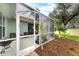 Relaxing screened patio perfect for outdoor enjoyment at 2831 Whispering Pine Ln, North Port, FL 34287