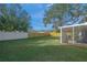 Expansive backyard, screened porch, and wooden fence at 3054 Markridge Rd, Sarasota, FL 34231