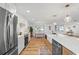 Modern kitchen with stainless steel appliances and quartz countertops at 3054 Markridge Rd, Sarasota, FL 34231