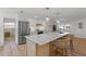 Modern kitchen with an island and stainless steel appliances at 3054 Markridge Rd, Sarasota, FL 34231