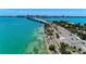 Stunning aerial view showcasing waterfront property and bridge access at 318 Barlow Ave # 71, Sarasota, FL 34232