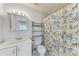 Bathroom with shower/tub combo, toilet, and fun decor at 318 Barlow Ave # 71, Sarasota, FL 34232