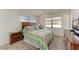 Charming bedroom with wood furniture and a tranquil atmosphere at 318 Barlow Ave # 71, Sarasota, FL 34232