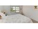 Serene bedroom with a queen-size bed and peaceful decor at 318 Barlow Ave # 71, Sarasota, FL 34232