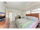 Bright bedroom with a comfortable bed and mirrored closet at 318 Barlow Ave # 71, Sarasota, FL 34232