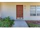 Front door entrance with walkway and landscaping at 318 Barlow Ave # 71, Sarasota, FL 34232