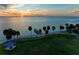 Tranquil waterfront park with pier, gazebo, and sunset views at 318 Barlow Ave # 71, Sarasota, FL 34232