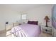 Well-lit bedroom with double bed, and two nightstands at 3530 Tree Line Dr # 4, Sarasota, FL 34231