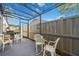 Covered patio with seating area, perfect for outdoor relaxation at 3530 Tree Line Dr # 4, Sarasota, FL 34231