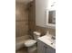 Bathroom with tub, toilet and vanity at 406 Barlow Ave # 65, Sarasota, FL 34232