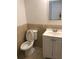 Small bathroom with white vanity and tile floor at 406 Barlow Ave # 65, Sarasota, FL 34232