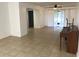 Spacious living room with tile floors and sliding glass doors at 406 Barlow Ave # 65, Sarasota, FL 34232