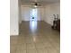 Spacious living room with tile floors and sliding glass doors at 406 Barlow Ave # 65, Sarasota, FL 34232