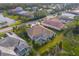 House with pool, neighborhood view from above at 4677 Sweetmeadow Cir, Sarasota, FL 34238