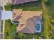 Aerial view showcasing the home's layout and pool at 4677 Sweetmeadow Cir, Sarasota, FL 34238