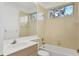 Neat bathroom featuring a bathtub and updated fixtures at 4677 Sweetmeadow Cir, Sarasota, FL 34238