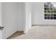 Well-lit bedroom with a closet and neutral carpet at 4677 Sweetmeadow Cir, Sarasota, FL 34238