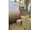 Clean bathroom with vanity, shower, and toilet at 5169 Oxford Dr, Sarasota, FL 34242