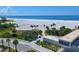 Aerial view of Siesta Beach, showing beach, ocean, and lifeguard station at 5169 Oxford Dr, Sarasota, FL 34242