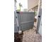 Private backyard access with gray composite gate at 5169 Oxford Dr, Sarasota, FL 34242