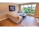 Living room with sectional sofa and large window at 5169 Oxford Dr, Sarasota, FL 34242