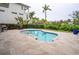 Relaxing kidney-shaped pool with patio at 5169 Oxford Dr, Sarasota, FL 34242