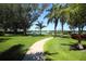 Well-maintained community park featuring benches, walkways, and lake views at 5171 51St W Ln, Bradenton, FL 34210